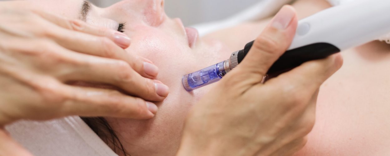 dermapen spa treatment Hardware cosmetology. mesotherapy, dermapen, treatment of face zone, face rejuvenation, close up